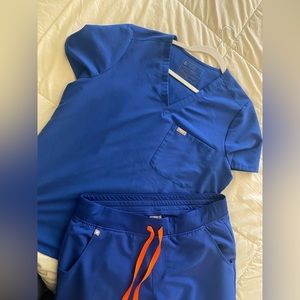 FIGS FOR SALE. ONLY WORN ONCE TO TRY ON.